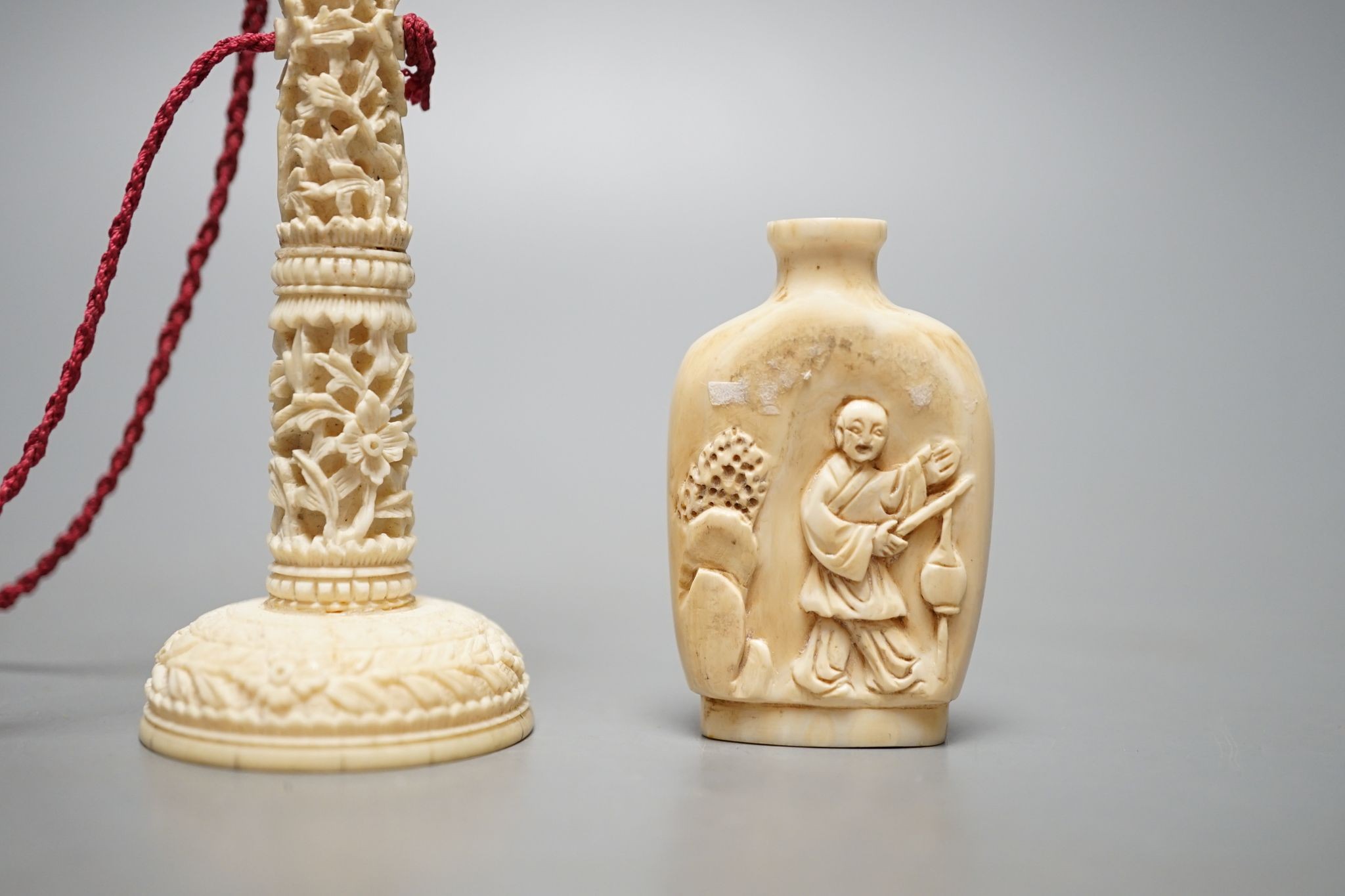 A Chinese export ivory spike and ball game, 16.5cm, and an ivory snuff bottle